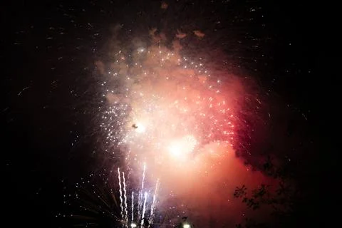 Fireworks exploding in smoke Stock Photos