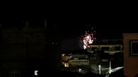 Fireworks, houses in foreground Stock Footage 77980598