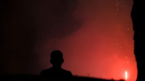 FIREWORKS KID HEAD NIGHT SLOW MOTION Stock Footage 92910928