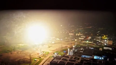 Fireworks light up night sky above Jelgava industrial area and surrounding Stock Footage 326369836
