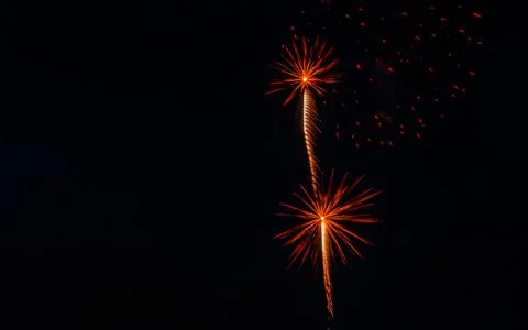 Fireworks Light up the Night Sky During a Celebration in the City Foto stock