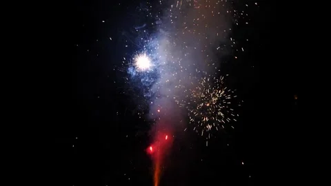 Fireworks Light Up Night Sky Stock Footage 262400120