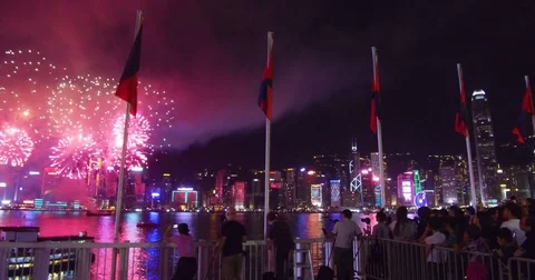 Fireworks light up the night sky over Hong Kong, China. Stock Footage