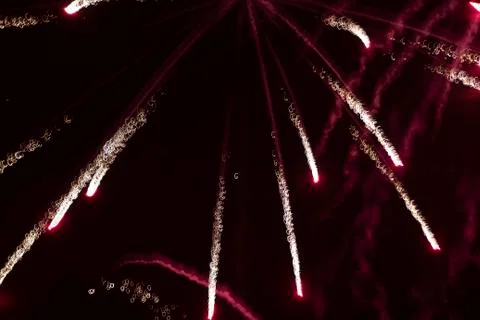 Fireworks light rays of red on a black background. Foto stock