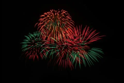 Fireworks light up in the sky, dazzling scene. Stock Photos