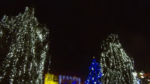 Fireworks light up sky over city. Holidays, celebrating New Year. Stock Footage 84087996