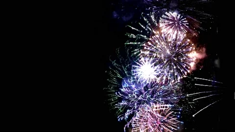 Fireworks light up the sky in slow motion. Stock Footage 102564703