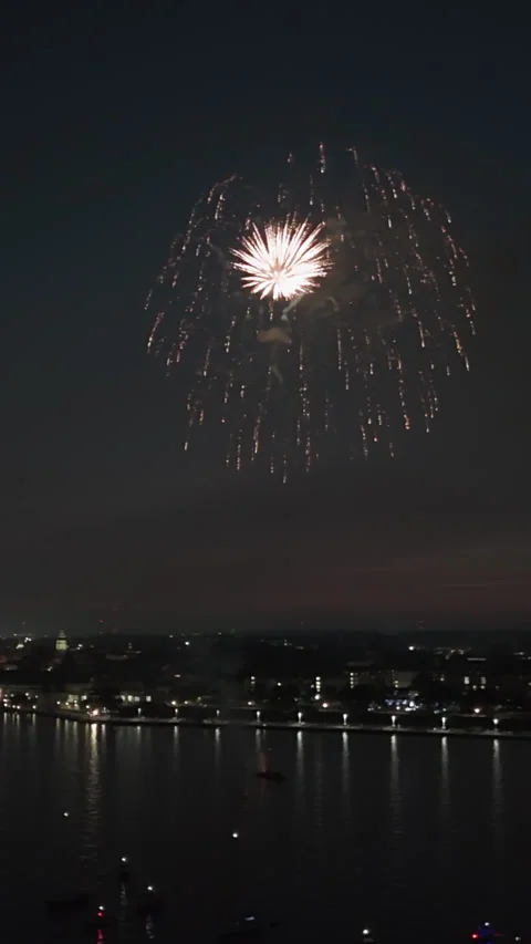 Fireworks Lighting Up The Night Sky In Ocean City, Maryland, USA - Vertical Shot Video stock 333961894