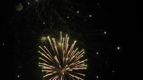 Fireworks magic creates shimmering trace ornaments in black night sky 스톡 사진