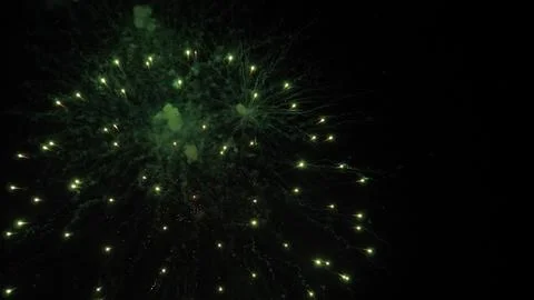 Fireworks magic creates shimmering trace ornaments in black night sky Stock Photos