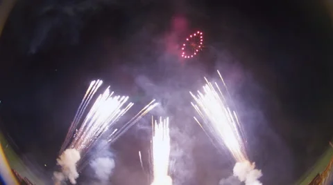 Fireworks with multiple explosions from below frame Stock Footage 59516433