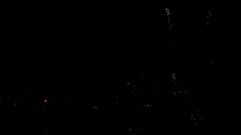 Fireworks at Night, Reverse Video Stock Footage 102379843