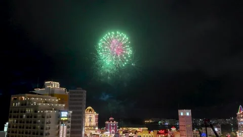 Fireworks over Chatan night cityscape in Okinawa, Japan Stock Footage 325631859