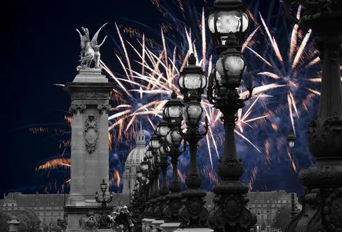 Fireworks over the Lamp posts on Alexander III Bridge. Paris, France Stock Photos