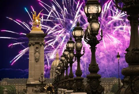 Fireworks over the Lamp posts on Alexander III Bridge. Paris, France Stock Photos