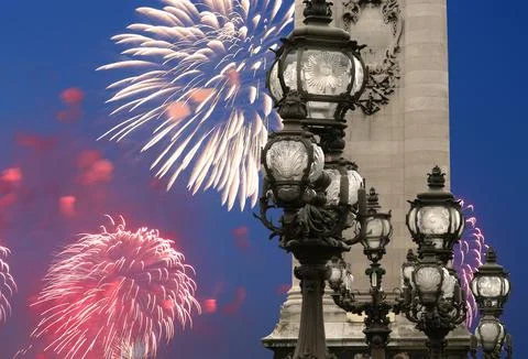 Fireworks over the Lamp posts on Alexander III Bridge. Paris, France Fotos Stock