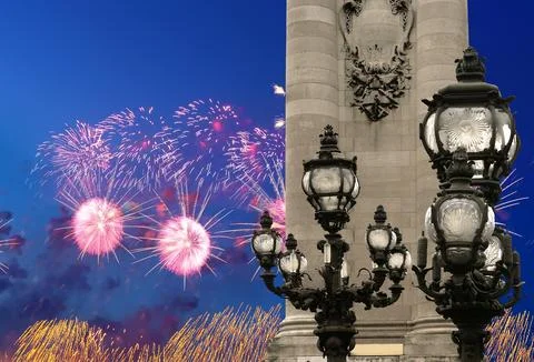 Fireworks over the Lamp posts on Alexander III Bridge. Paris, France Stock Photos