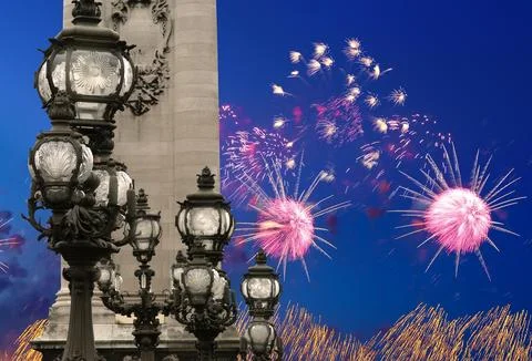 Fireworks over the Lamp posts on Alexander III Bridge. Paris, France Stock Photos