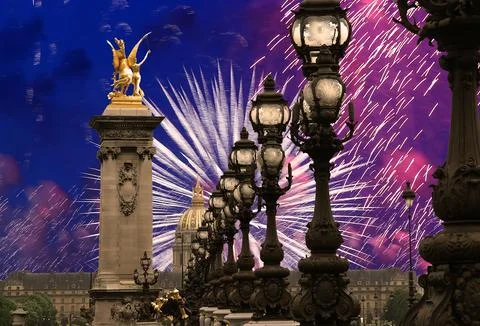 Fireworks over the Lamp posts on Alexander III Bridge. Paris, France Stock Photos