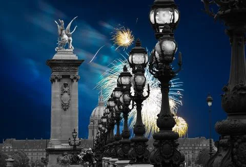 Fireworks over the Lamp posts on Alexander III Bridge. Paris, France Stock Photos
