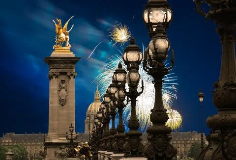 Fireworks over the Lamp posts on Alexander III Bridge. Paris, France Stock Photos