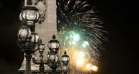 Fireworks over the Lamp posts on Alexander III Bridge. Paris, France Stock Photos