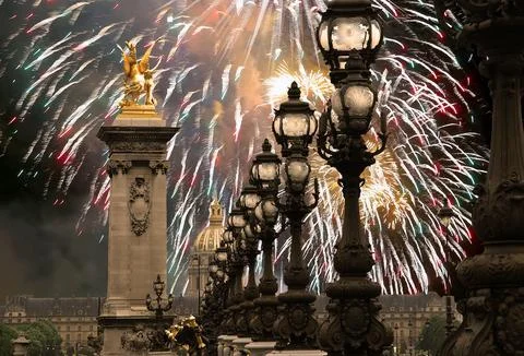 Fireworks over the Lamp posts on Alexander III Bridge. Paris, France Stock Photos