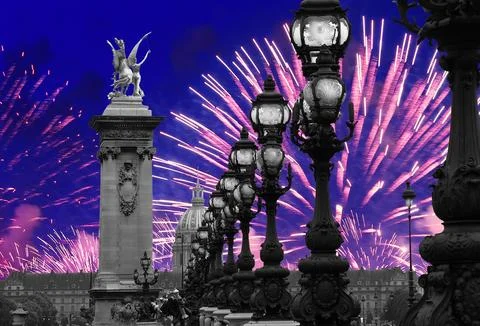Fireworks over the Lamp posts on Alexander III Bridge. Paris, France Stock Photos