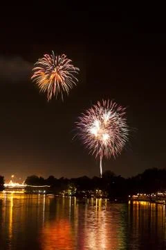 Fireworks over a river Stock Photos