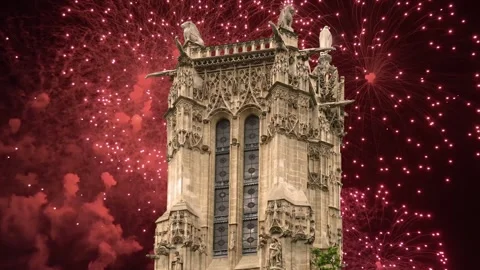 Fireworks over the Saint-Jacques Tower (Tour Saint-Jacques). Paris, France Stock Footage 253638660