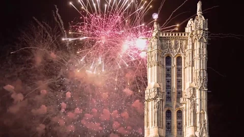 Fireworks over the Saint-Jacques Tower (Tour Saint-Jacques). Paris, France Stock Footage 253641443