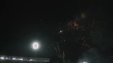 Fireworks over stadium Stock Footage