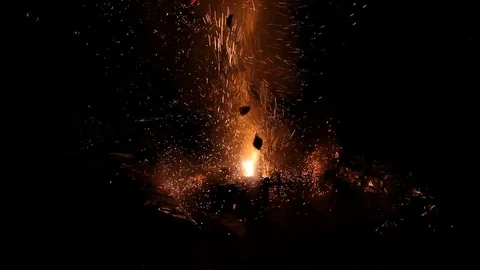 Fireworks packs on ground, explosions and smoke Stock Footage 81217533