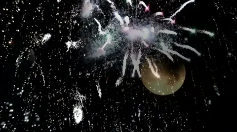 Fireworks set against timelapse full moon Stock Footage 1043952