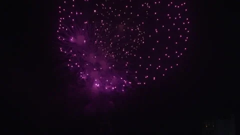 Fireworks shoot into the sky exploding one by one. Slow Motion Vídeos de archivo 204789821