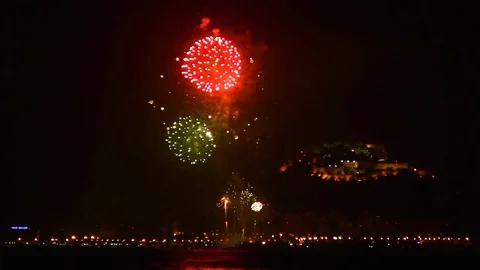 Fireworks show in Postiguet Beach in the Mediterranean Sea in Spain. Stock Footage 107657162