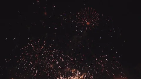 Fireworks in slow motion on the black sky Video stock 79646182
