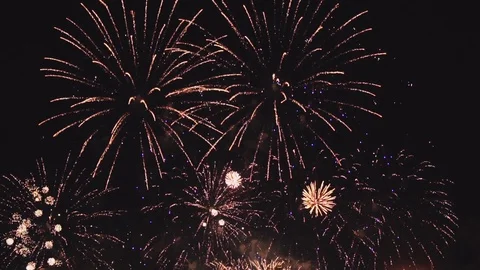Fireworks in slow motion on the black sky.  Stock-Footage 79798921