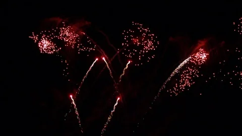 Fireworks streaking and rapidly exploding in the night sky Stock Footage 92673568