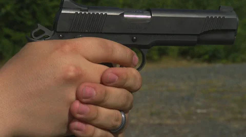Firing Hand Gun, Close-Up Stock Footage 35295836