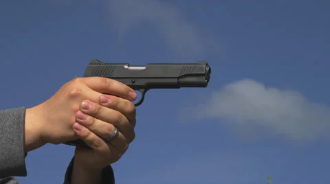 Firing Hand Gun Stock Footage 35284940