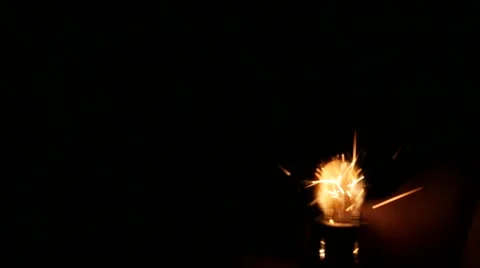Firing up lighter in dark slow-mo 1920X1080 FullHD footage - Light sparkles Stock Footage 53608993