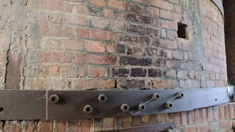 Firing pottery in an ancient brick kiln. Stock Footage 272492442