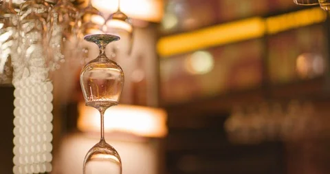 Firing up stack of glasses in flames with a drink Stock Footage 106179268