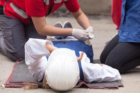 First aid after work accident Stock Photos