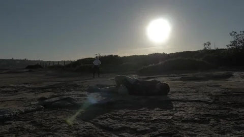 First Aid Assistance - Man Massaging His Injured Knee While Lying On Stock Footage 144701584