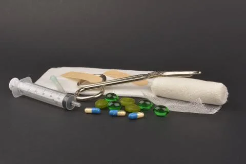 First aid box, on dark background Stock Photos