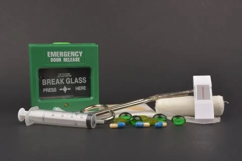 First aid box, on dark background Stock Photos