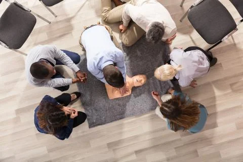 First Aid Instructor Demonstrating CPR Training On Dummy Foto stock