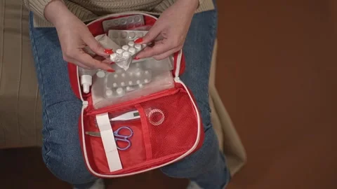 First aid kit and pills Stock Footage 246370313